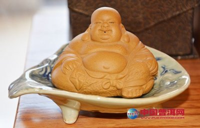 谮